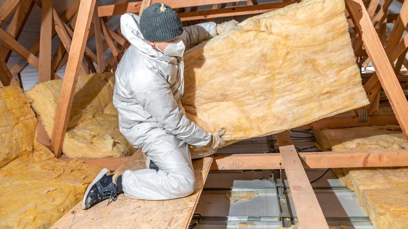 installing a new insulation after attic insulation removal