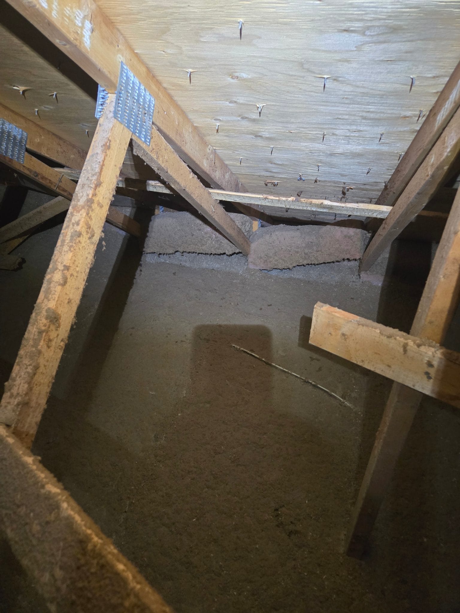 At the eaves &mdash; where coverage is thinnest and wind-washing hits hardest.