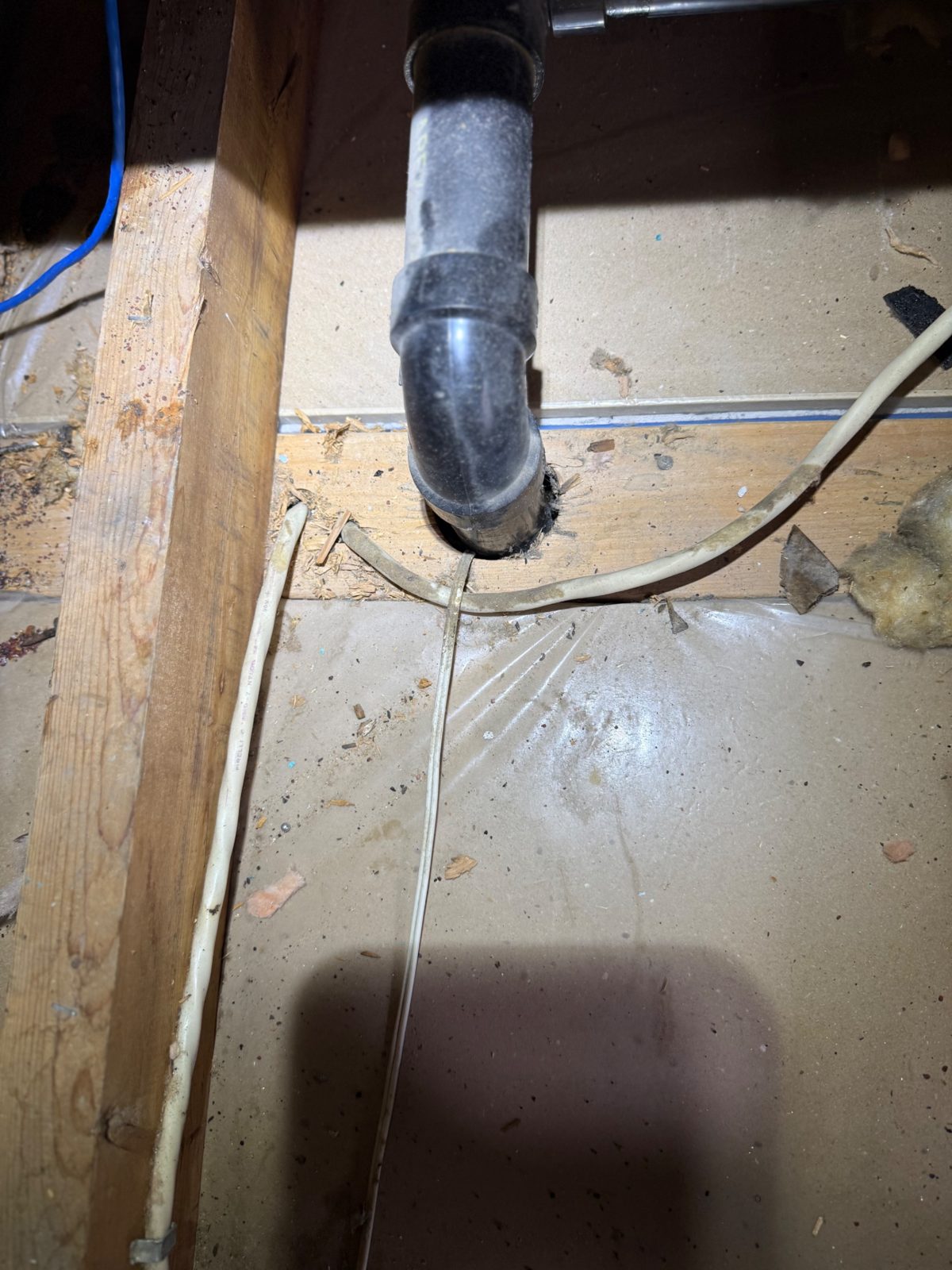 Found on inspection: an unsealed plumbing stack — a straight air highway from the basement to the attic.