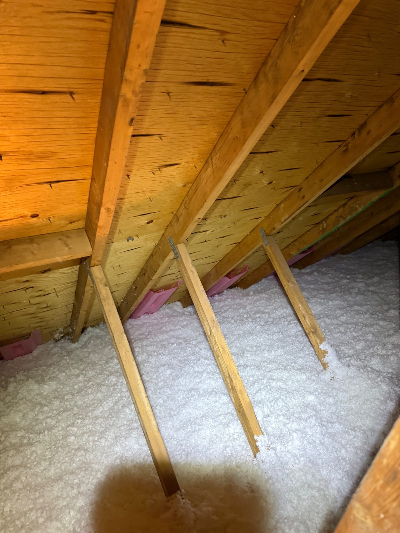 At the eaves: cleared bays, protected airflow, coverage to the edge.