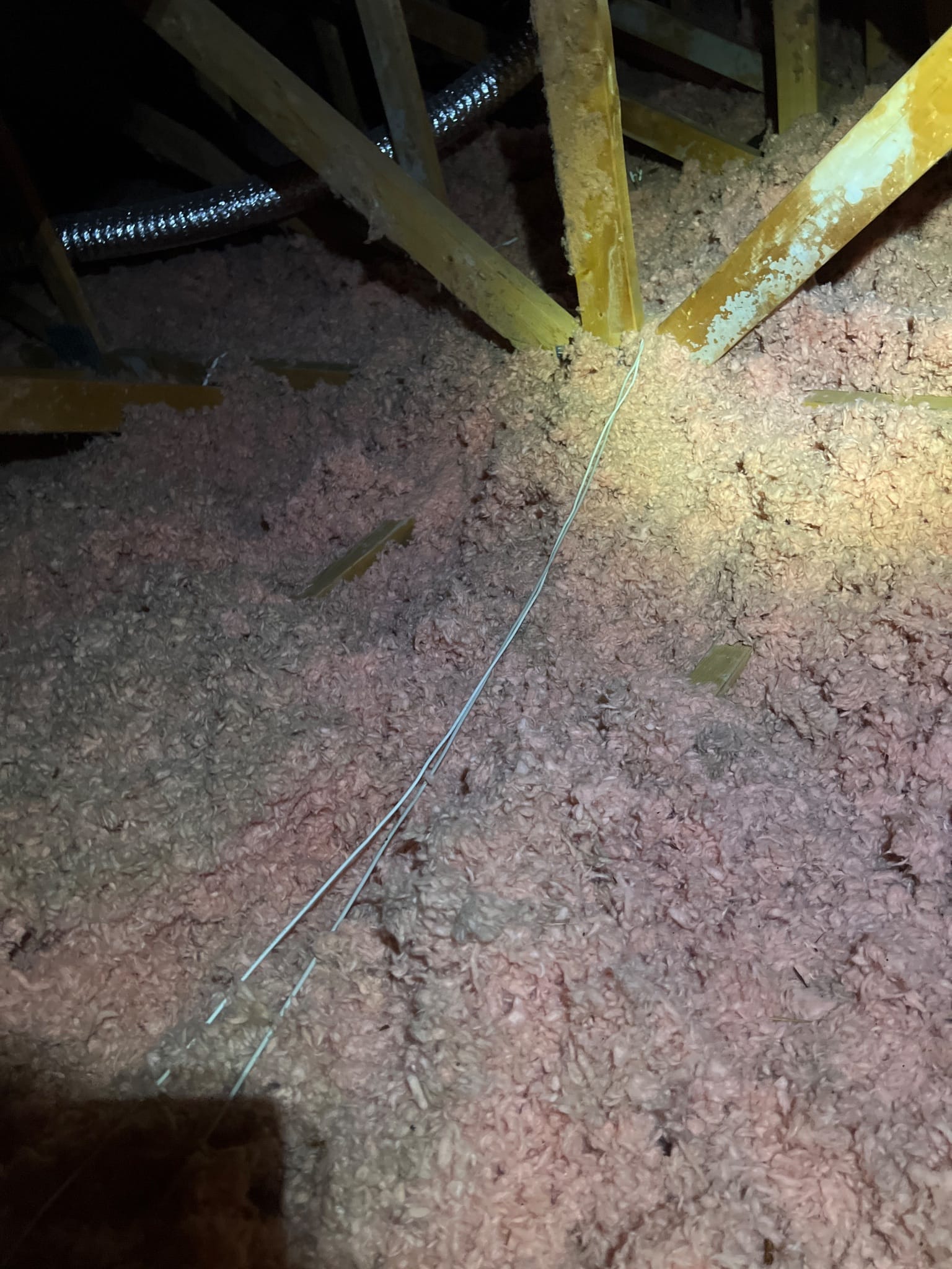 One of the leak points found under a thin zone &mdash; sealed before a bag of insulation went in.